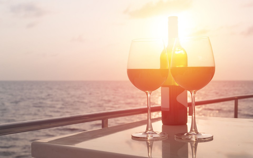 Wines against sunset on board the yacht