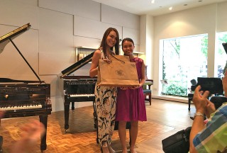 Celine Goh, General Manager of Steinway Gallery Singapore, with Nicole Tay