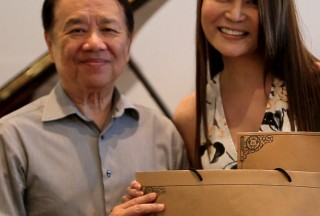 Celine Goh, General Manager of Steinway Gallery Singapore, with Professor Yu Chun Yee, Close-up