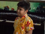 Pianovers Meetup #1, Ms He Zong Yi's student, Isaiah Patrick, getting ready to perform