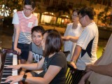 Pianovers Meetup #9, Junn Lim plays, while others look on