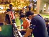 Pianovers Meetup #17, Jimmy playing, while others look on